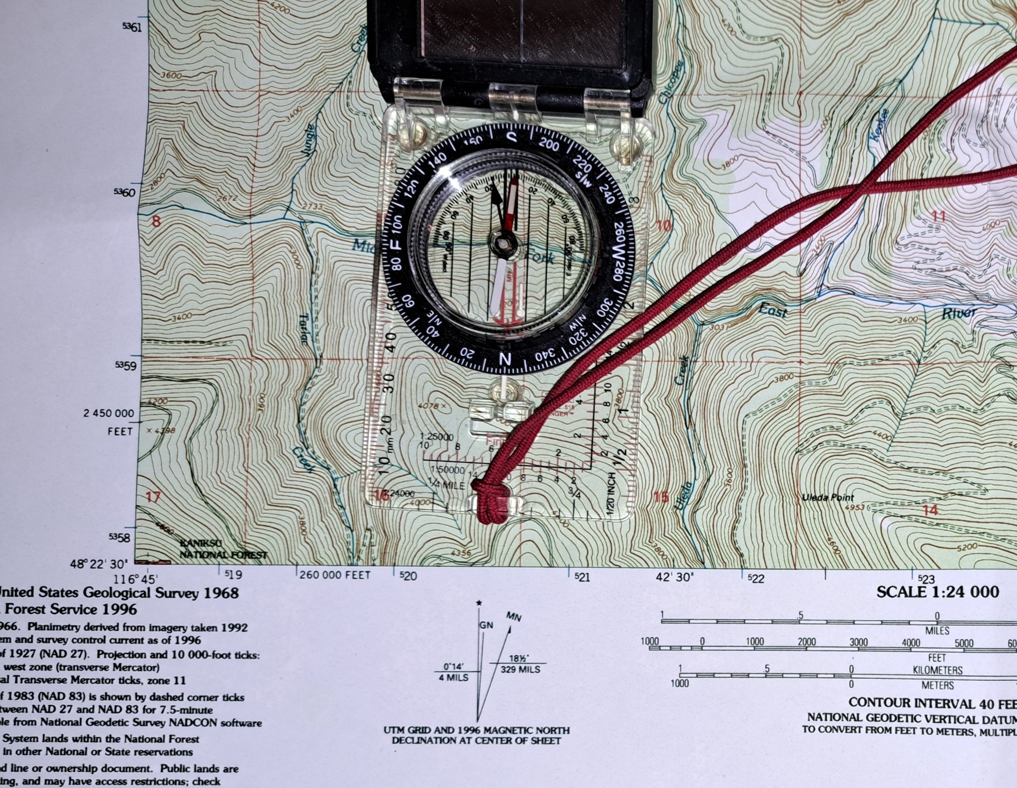 Topographic map and compass